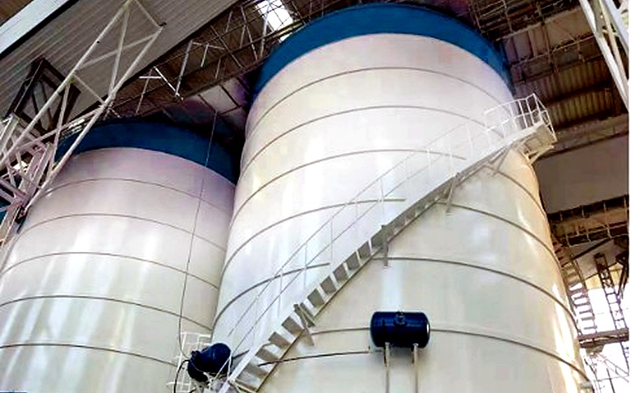 Mineral powder silos installed inside a production building