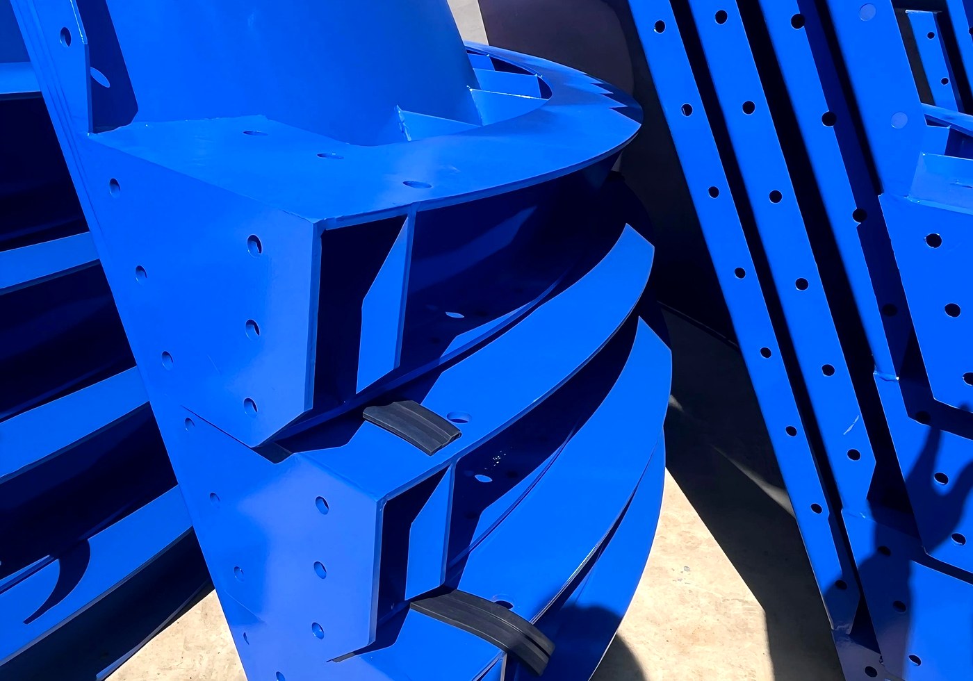 Finished coated cement silo components prepared for inspection
